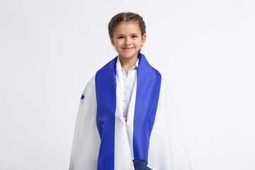 Little girl with the flag of Israel on white background