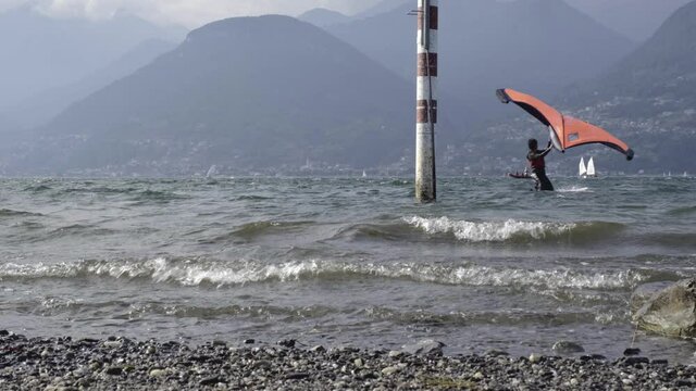 Windy Evening On Como Lake With Kitesurfing