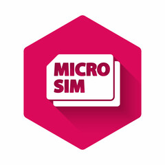 White Micro Sim Card icon isolated with long shadow. Mobile and wireless communication technologies. Network chip electronic connection. Pink hexagon button. Vector