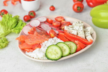 Tasty poke bowl on light background