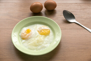 Half boiled eggs. Malaysian breakfast.