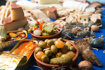 Assorted table of typical Spanish tapas to share with friends 