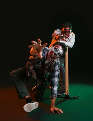 Scary zombies on dark background