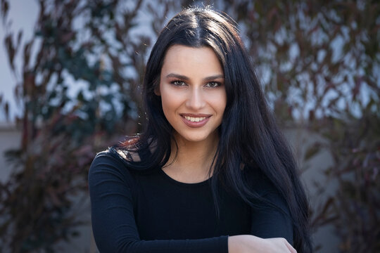 Portrait of a mediterranean and middle eastern mixed race woman with long, black hair