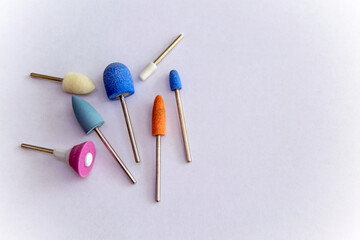 Ceramic drill. Ceramic milling machine. Tool for hardware manicure. Nozzle for hardware pedicure. Cosmetic equipment. Isolated on a white background.