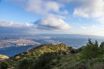 Picturesque landscape with mountains. Landscape and beautiful sunset on Montserrat mountain. Rock formations and cliffs in the Catalan Natural Park of Montserrat. Barcelona, Catalonia, Spain
