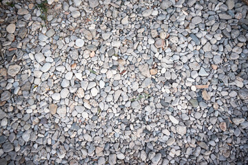 Sea pebbles on the coast abstract background. Top view.
