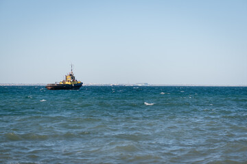 Ship in the sea water background.