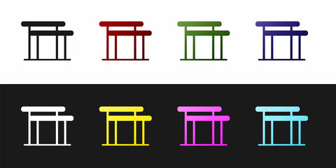 Set Gymnastics equipment uneven bars icon isolated on black and white background. Vector