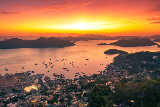 Aerial view in Coron Island, Palawan, Philippines. Looking over Coron Town and Bay at Sunset.