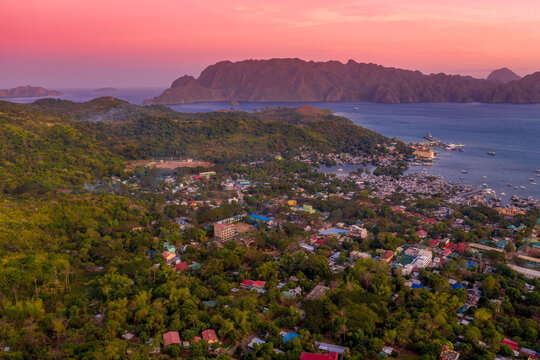 Aerial view in Coron Island, Palawan, Philippines. Looking over Coron Town and Bay at Sunset.