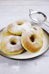 Donat pandan or pandan doughnuts or donuts is a classic recipe for super soft and fluffy doughnuts made using pandan leaf paste. 