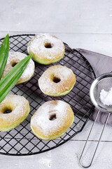 Donat pandan or pandan doughnuts or donuts is a classic recipe for super soft and fluffy doughnuts made using pandan leaf paste. 