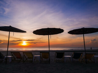 umbrella, chair, silhouette on the beach