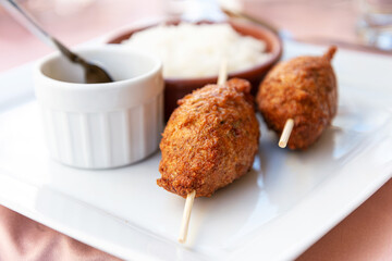 Delicious kebabs on the table