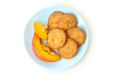 Tasty pumpkin cookies isolated on white background.