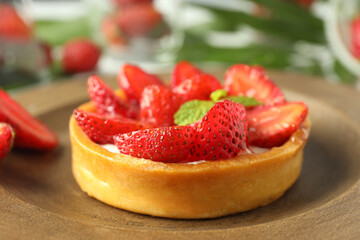 Concept of delicious food with strawberry tart, close up