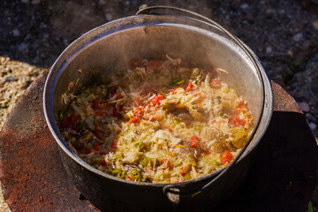 Spicy stewed cabbage and meat with beef and sauerkraut Bigos is traditional  food.