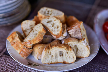 plates with slices of bread baked in the hearth