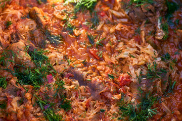 Spicy stewed cabbage and meat with beef and sauerkraut Bigos is traditional  food.