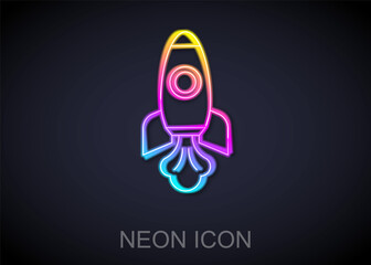 Glowing neon line Rocket ship icon isolated on black background. Space travel. Vector