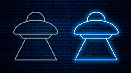 Glowing neon line UFO flying spaceship icon isolated on brick wall background. Flying saucer. Alien space ship. Futuristic unknown flying object. Vector