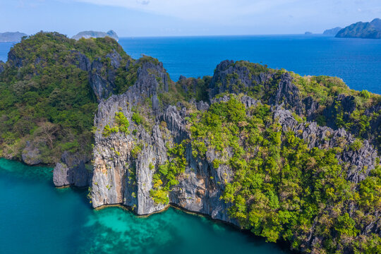 Aerial drone view azure sea and of tourist boats around the beautiful big and small lagoons in El Nido, Palawan, Philippines. © Timelapse4K