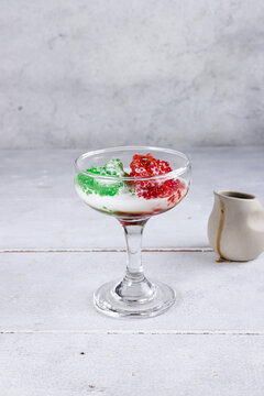 Sago Gula Melaka. Sago tapioca pearls drenched with coconut milk and palm sugar. Bubur mutiara.