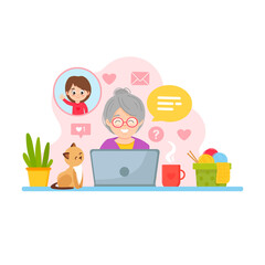 Happy grandma with laptop. Grandmother communicates with granddaughter via video call Online communication