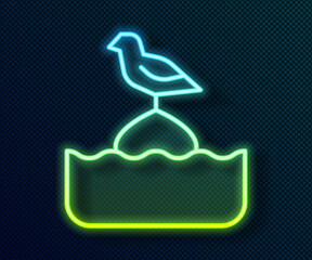 Glowing neon line Seagull sits on a buoy in the sea icon isolated on black background. Vector