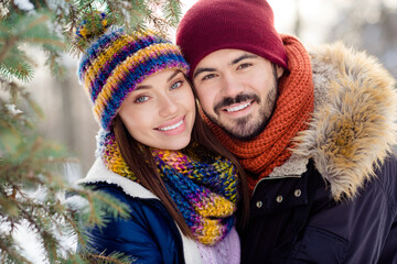 Photo of young attractive couple happy positive smile weekend together forest winter holiday scarf romantic