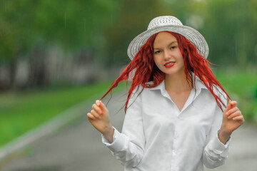 Beautiful teen girl with in white male shirt and hat - 461003986
