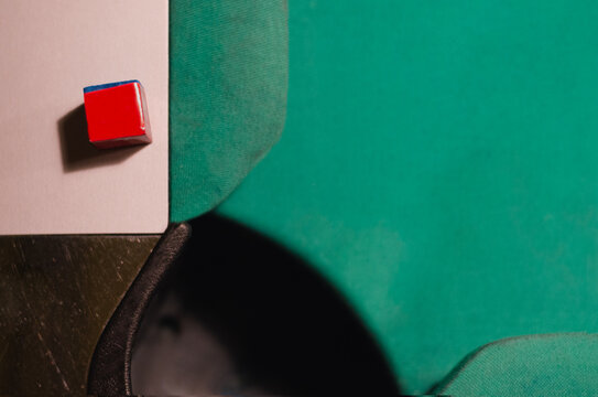 Green Pool Table With A Blue Chalk. Viewed From Above. Horizontal Image.