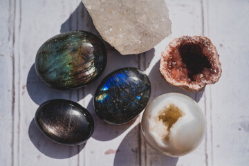 colorful crystals and stones on white background