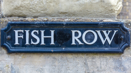 Fish Row name sign, close up of old style of English street plaque, shallow depth of field, autumn season 2021 - 461008753