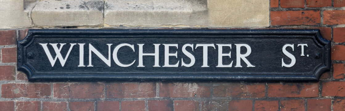 Winchester Street name sign, close up of old style of English street plaque, shallow depth of field, autumn season 2021