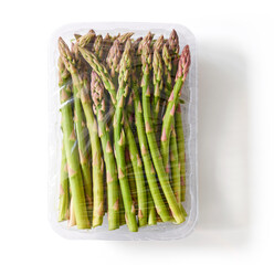 Fresh asparagus packaged and sealed; isolated on white, from above