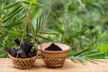 Bamboo Charcoal and powder on nature background.