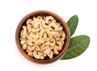 Dried cashew nuts fruits and green leaves isolated on background with clipping path.top view ,flat lay.