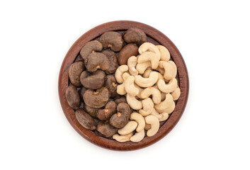 Cashews seeds are arranged in a yin and yang isolated on white background with clipping path.top view,flat lay..