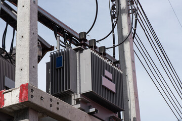 Power transformer on nature background.