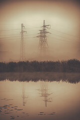 electric lines in the fog, sepia vertical