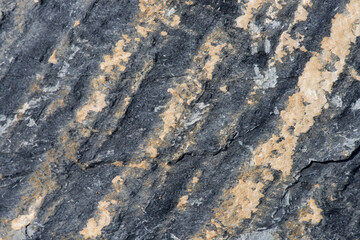 Stones wall on nature background.