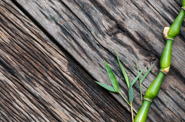 Buddha's belly bamboo wood on an old wood background.