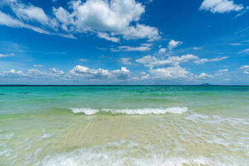 Crystal sea and blue sky background. Tropical beach.