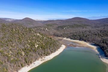 Aerial view of desiccation of Sukko lake on on sunny winter day. Krasnodar Krai, Black Sea, Russia.