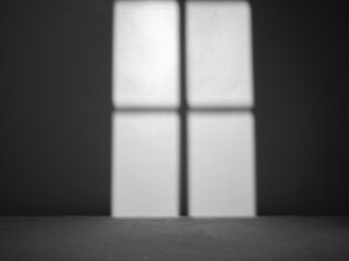 Empty concrete surface with light from window on background