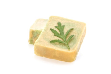 Soap with mugwort extract isolated on white background.