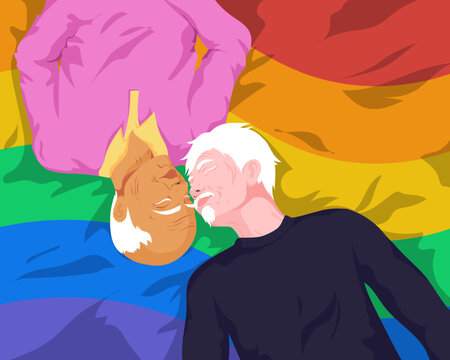 Overhead view of senior interracial couple laying on pride rainbow flag 