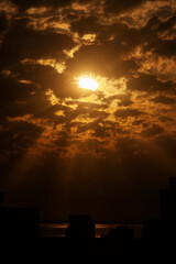 spectacular sunrise with sun among the clouds